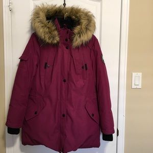 Down filled winter jacket with faux fur hood